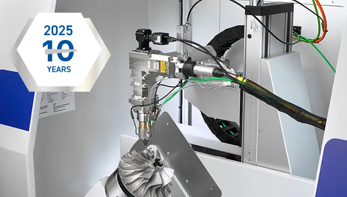 Hornet laser cladding system with a 10 years badge in the top left corner 